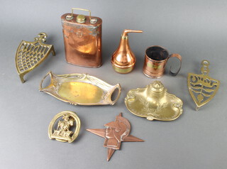 An embossed copper Festival of Britain badge 16cm x 14cm, 2 brass iron stands, an Art Nouveau embossed brass twin handled dish 22cm x 13cm, a copper and brass cylindrical milk measure, copper and brass hot water bottle, etc 