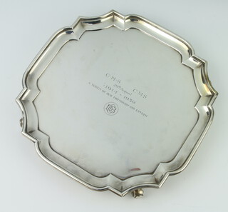 A silver salver with pie crust rim London 1937 with presentation inscription 26cm, 744 gms 