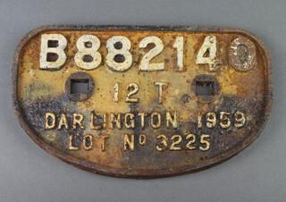 A cast iron railway wagon plate marked B882140 12T Darlington 1959 lot no. 3225 16cm x 28cm 