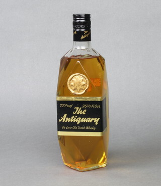 A 1970's 26 2/3 fl ozs bottle of The Antiquary De Luxe Old Scotch Whisky 70 percent proof 