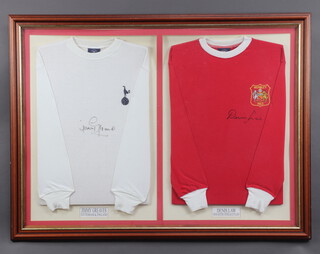 A late 1990's Manchester United replica Cup Final shirt as worn in the 1963 F.A. Cup Final against Leicester City signed by Denis Law, together with a ditto Tottenham Hotspur shirt as worn in the 1960's signed by Jimmy Greaves, framed as one 82cm x 113cm.  This lot was purchased by the vendor at a Crystal Palace Football Club Millennium Sporting Dinner in December 1999 at which Denis Law and Jimmy Greaves were guest speakers, the lot also includes an advertising poster for the dinner and fold out menu with auction lot details for the evening  