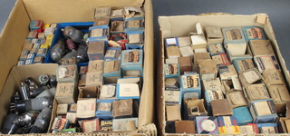 Two cardboard boxes containing a collection of boxed and unboxed valves including Mallard, Mazda and others 