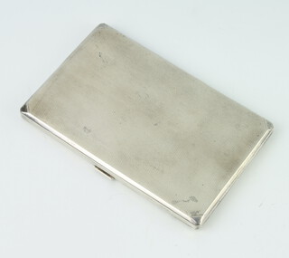 A silver engine turned rectangular cigarette case Birmingham 1937, 188gms, 13cm