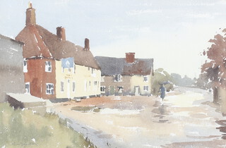 ** John Yardley born 1933, watercolour signed, village scape with pub and buildings "Rainy Day" 31cm x 47cm **PLEASE NOTE - Works by this artist may be subject to Artist's Resale Rights 