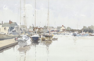 ** John Yardley born 1933, watercolour signed, harbour scene with vessels and distant buildings 31cm x 47.5cm **PLEASE NOTE - Works by this artist may be subject to Artist's Resale Rights 