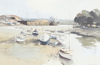 ** John Yardley born 1933, watercolour signed, harbour scene with beached boats and distant cargo ship 31cm x 47cm **PLEASE NOTE - Works by this artist may be subject to Artist's Resale Rights