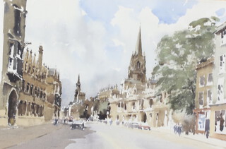 ** John Yardley born 1933, watercolour signed, The High Oxford, street scene with figures 46cm x 66cm **PLEASE NOTE - Works by this artist may be subject to Artist's Resale Rights 