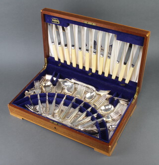A mixed quantity of silver plated cutlery contained in a mahogany canteen 