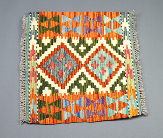 A white, green and brown Chobi kilim rug 52cm x 56cm