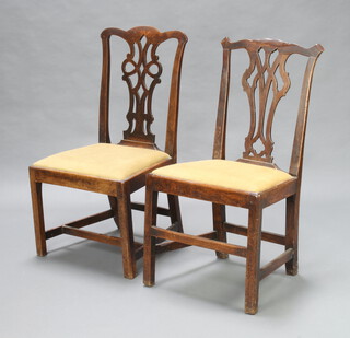 Two similar Georgian Chippendale style slat back mahogany dining chairs with upholstered seats raised on square supports, 1 measures 95cm h x 42cm w x 43cm d (seat 31cm x 25cm) the other 99cm h x 50cm w x 39cm d (seat 28cm x 24cm) 
