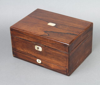 A Victorian rosewood and inlaid mother of pearl trinket box with hinged lid revealing a fitted interior with secret drawer to the base 15cm h x 30cm w x 21cm d 