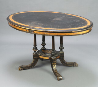 A Victorian walnut and ebonised oval Loo table raised on 4 turned and fluted columns with platform base and scrolled feet 68cm h x 120cm w x 84cm d 