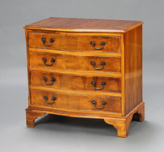 A Georgian style serpentine fronted yew chest of 4 drawers, raised on bracket feet 72cm h x 73cm w x 44cm d 