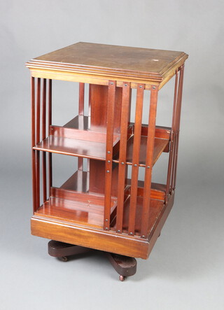 An Edwardian square inlaid mahogany 2 tier revolving bookcase 90cm h x 52cm w x 52cm d 