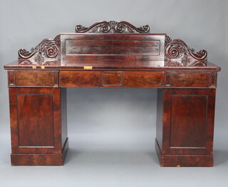 A William IV carved mahogany pedestal sideboard with raised carved back, the apron fitted 4 drawers, the pedestals enclosed by panelled doors 133cm h x 191cm w x 56cm d
