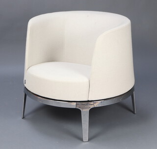 Materia, an Omni design chrome framed revolving armchair 72cm h x 70cm w x 69cm d (seat 40cm x 36cm) 