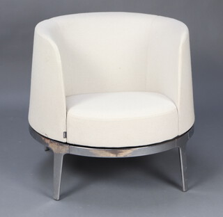 Materia, an Omni design chrome framed revolving armchair 72cm h x 70cm w x 69cm d (seat 40cm x 36cm)