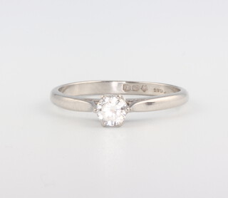 A platinum single stone brilliant cut diamond ring, approx 0.3ct, 3 grams, size L 1/2 