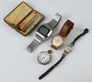 A gentleman's mid-Century gilt cased Zeih calendar wristwatch with seconds at 6 o'clock, 2 other watches, a silver fob watch and a cigar holder 
