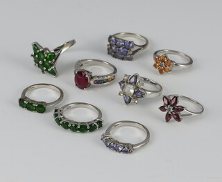 Nine silver gem set dress rings, size N 