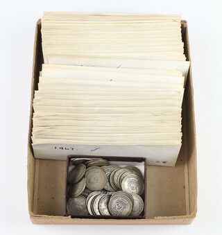 A quantity of pre-1947 shillings 266 grams together with a quantity of post 1947 coinage 