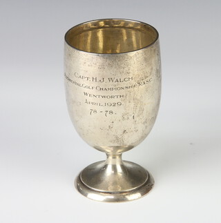 A silver bulbous cup Sheffield 1925, 12cm, 128 grams, with presentation inscription 