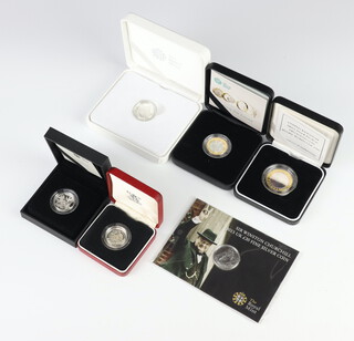 A silver proof one pound coin and 2 others, a silver proof 2017 Nations of The Crown one pound, a silver proof Piedfort two pound coin Rugby World Cup 1999 and a 2015 twenty pound fine silver coin 