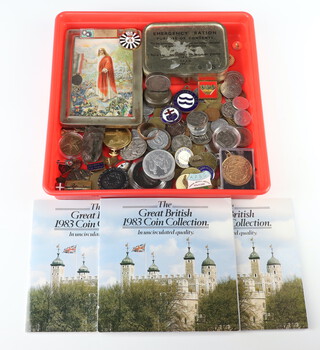 A quantity of commemorative crowns and coins including 3 1983 coin collections