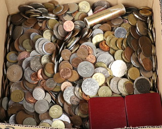 A large quantity of world coins and banknotes 