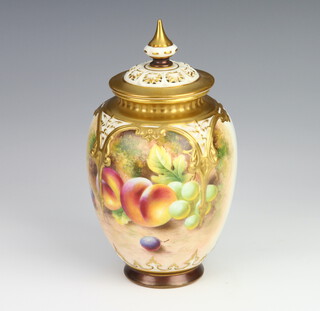 A Royal Worcester oviform vase decorated with fruits by Holroyd, having a reticulated lid 17cm 