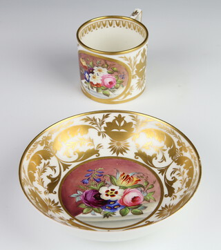 A 19th Century Derby coffee can and saucer decorated with spring flowers 