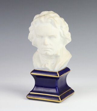 A 20th Century Limoges bisque porcelain bust of Beethoven, raised on a blue and gilt glazed plinth 21cm 