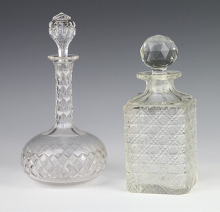 A square spirit decanter and stopper 21cm, an Edwardian mallet decanter and stopper 24cm 