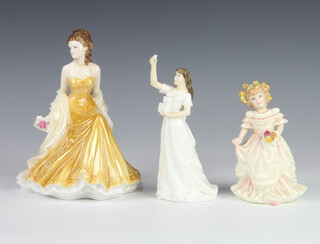 A Royal Worcester figure - Golden Wedding Anniversary 17cm, a Royal Doulton figure - Happy Christmas 17cm and a ditto Bridesmaid HN3476 13cm 