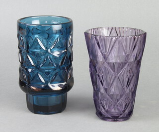 A Studio amethyst glass vase 16cm, a green glass vase 16cm