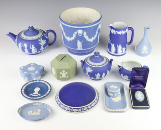 A Wedgwood green Jasper Royal Investiture 1969 money bank, a blue jardiniere 14cm, teapot, milk jug, cream jug, sugar bowl and cover, vase, stand, 2 dishes, pill box and brooch 