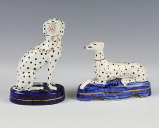 A Victorian Staffordshire figure of a seated Dalmatian with golden lead 13cm, a ditto pen stand of a reclining hound 12cm 