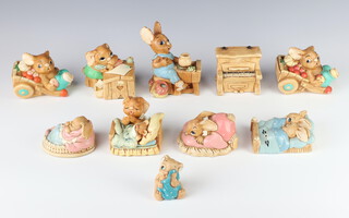A Pendelfin figure of a bunny potter 12cm, 8 other bunny groups and a piano 
