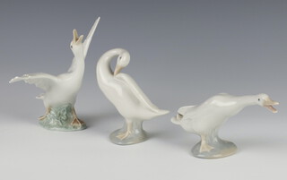A Lladro figure of a goose 13cm, 2 others 10cm 