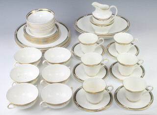 A Royal Doulton Forsyth pattern part tea/dinner service comprising 6 tea cups (2 cracked), 6 saucers, a milk jug (chipped), sugar bowl, 6 two handled bowls, 6 side plates, 5 dinner plates, 2 oval vegetable dishes and 6 dessert bowls