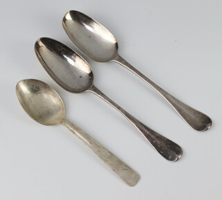 A pair of early Georgian silver table spoons, Old English pattern and a later ditto 160 grams 