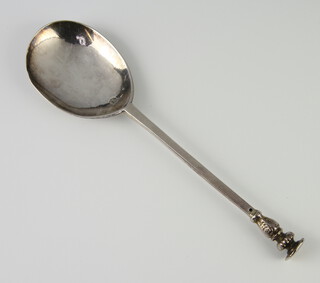 A Charles I style silver seal top spoon with engraved end M? 66 ? H, ex gilt bowl, 52.8 grams, makers mark RC, rubbed marks, 17cm 
