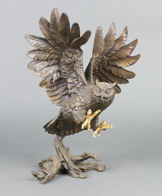 A bronze figure of an owl in flight 30cm x 24m x 12cm, the base indistinctly signed and marked 91IEM 