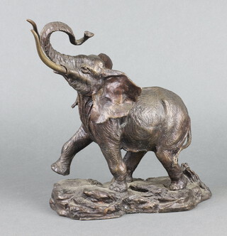 Franklin Mint for the African Wildlife Foundation, a bronze figure an elephant "Giant of Strength" 23cm h 