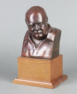Franklin Mint, after Oscar Nemon, a bronze head and shoulders portrait bust Sir Winston Churchill, raised on a mahogany base 22cm x 14cm x 11cm 