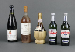 A bottle of 1987 Chateau Guiteronde Sauternes white wine, a bottle of Les Meysonniers Crozes-Hermitage, a 50cl bottle of Vino Liquoroso II Santo Giglio di Firenze and two 35cl bottles of Pernod  