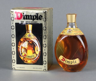 A 26 2/3 fl ozs bottle of Dimple Haig Scotch Whisky, boxed 