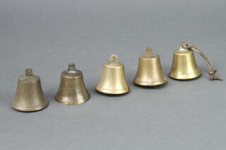Five gilt metal bells 5cm x 4cm 