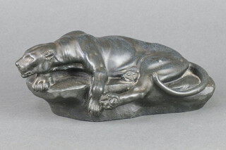 After C Masson, a bronze figure of a reclining leopard 8cm x 22cm x 13cm 