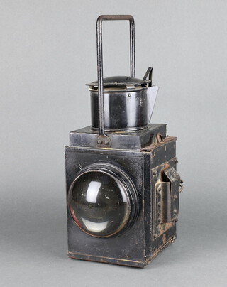 An LMS bullseye railway lantern in a black painted case 47cm x 17cm x 16cm 